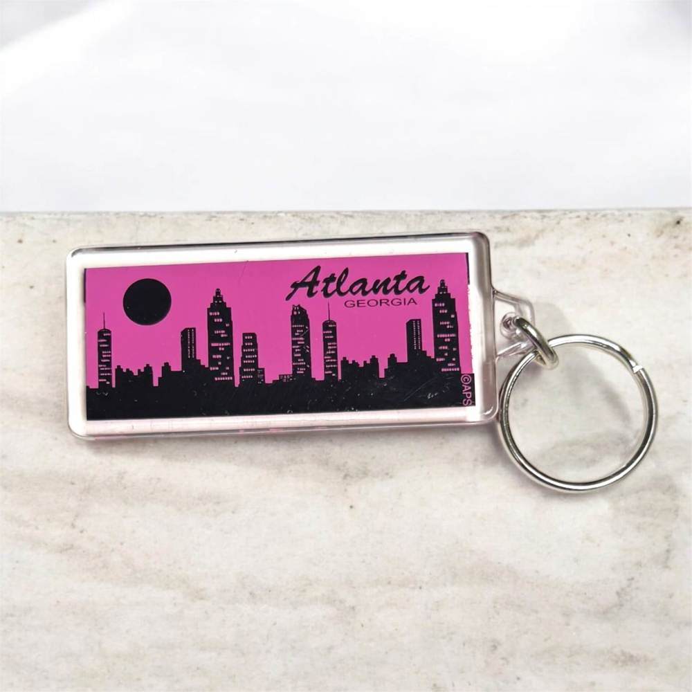 Pink Atlanta key chain with Atlanta Skyline in black