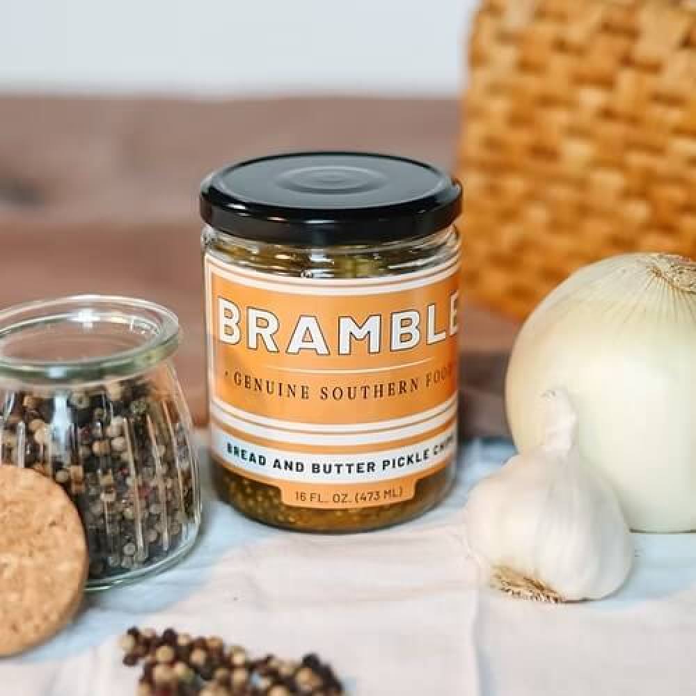 Jar of Bramble bread and butter pickles from Georgia surrounded by spices
