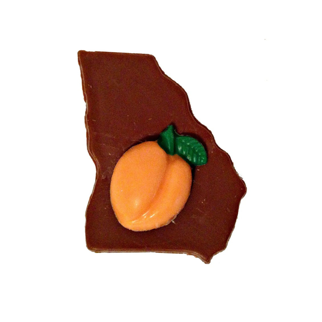 Chocolate piece in the state of Georgia with a small peach-shaped candy on a white background