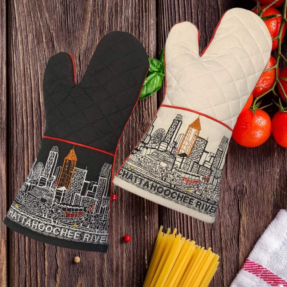 Atlanta oven mitt embroidered with the Atlanta skyline shown in two color options of cream and black.