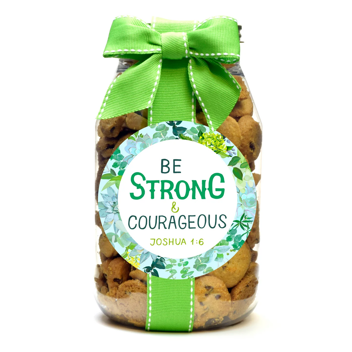 A clear jar filled with chocolate chip cookies, tied with a bright green ribbon and bow, and wrapped with a round label that reads &