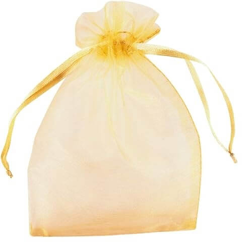 Sheer gold organza drawstring bag on a white background