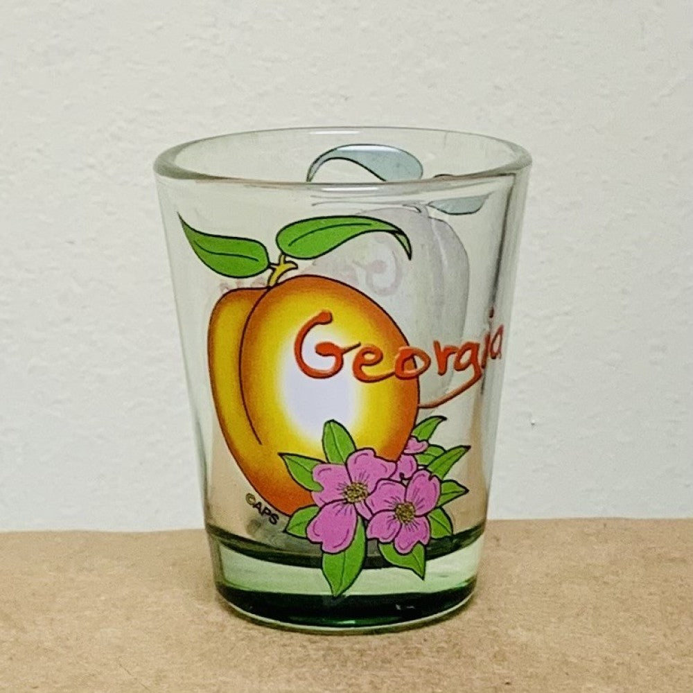 Clear shot glass with Georgia Peach and pink dogwood flowers