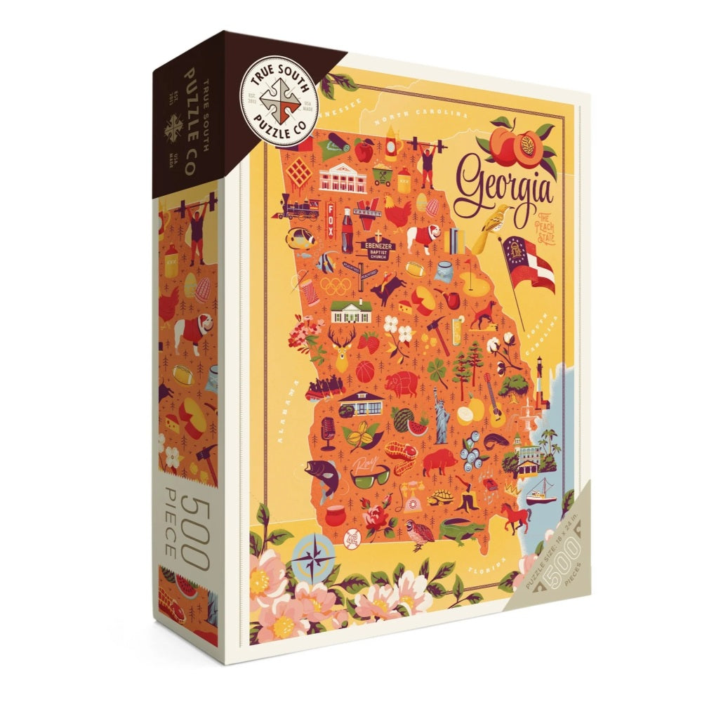 Front of the box of a Georgia Puzzle with cities and iconic images