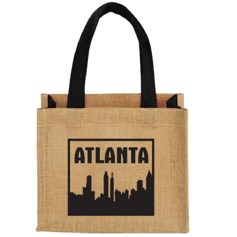 Natural burlap Atlanta tote bag features the city name above a skyline silhouette.