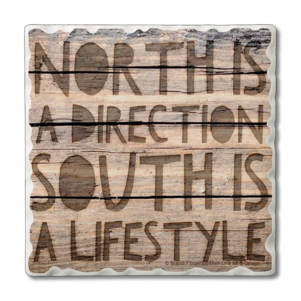 Absorbent coaster that reads North is a direction but South is a lifestyle