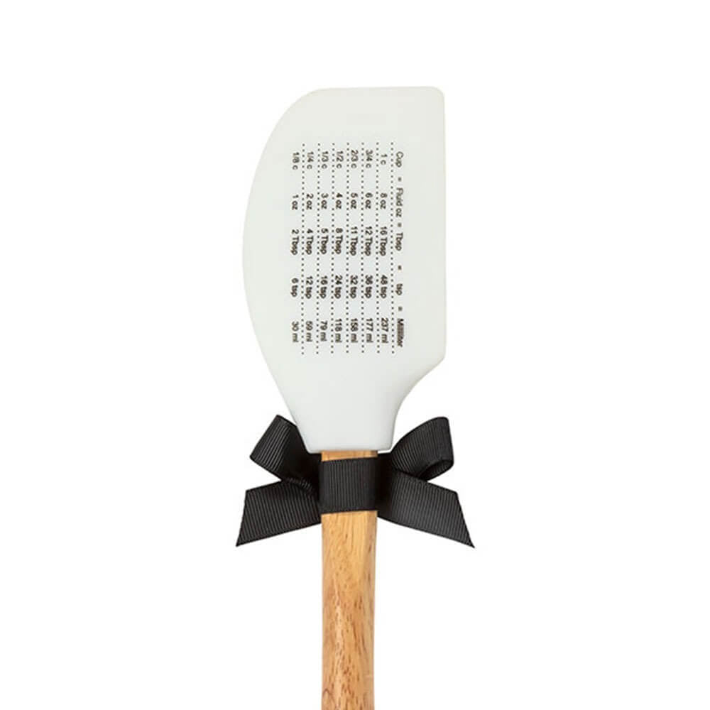Back view of a Georgia white spatula with wooden handle, black ribbon and cooking measurements on a white background