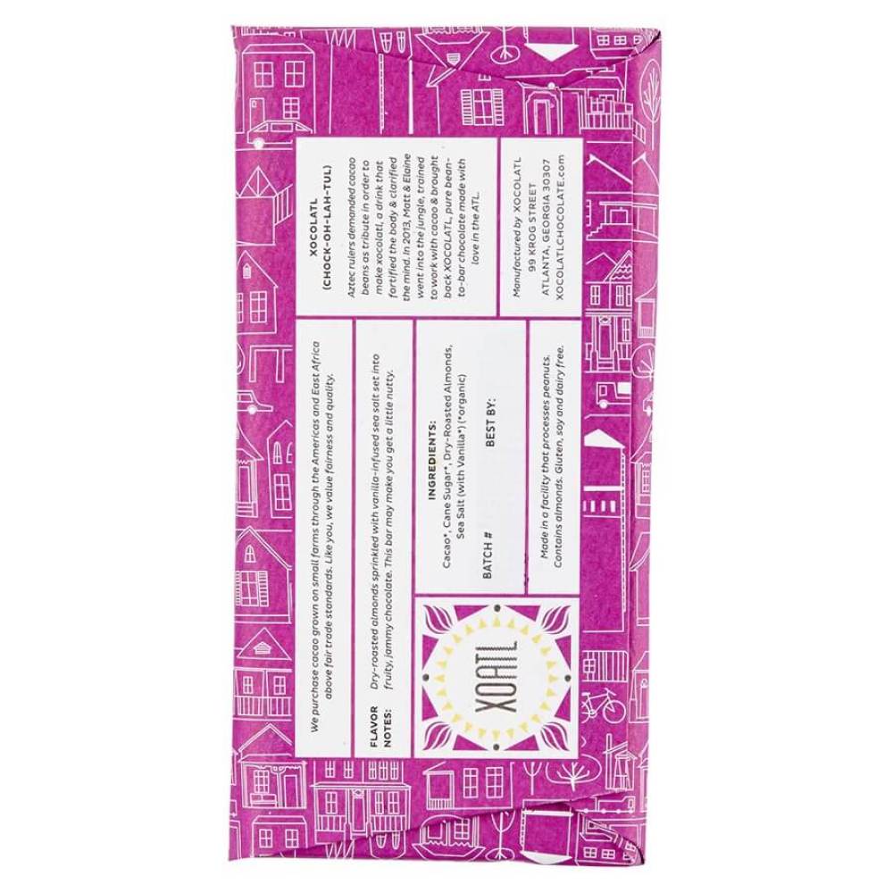 Backside of Xocolatl Go Nuts Chocolate with pink package with white text and illustrations on a white background