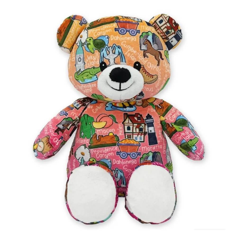 Colorful teddy bear printed with city names and icons from Georgia.