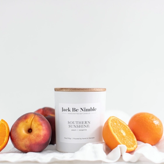 Candle labeled &