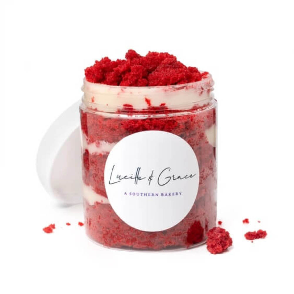 Red velvet cake jar layered with cream cheese frosting