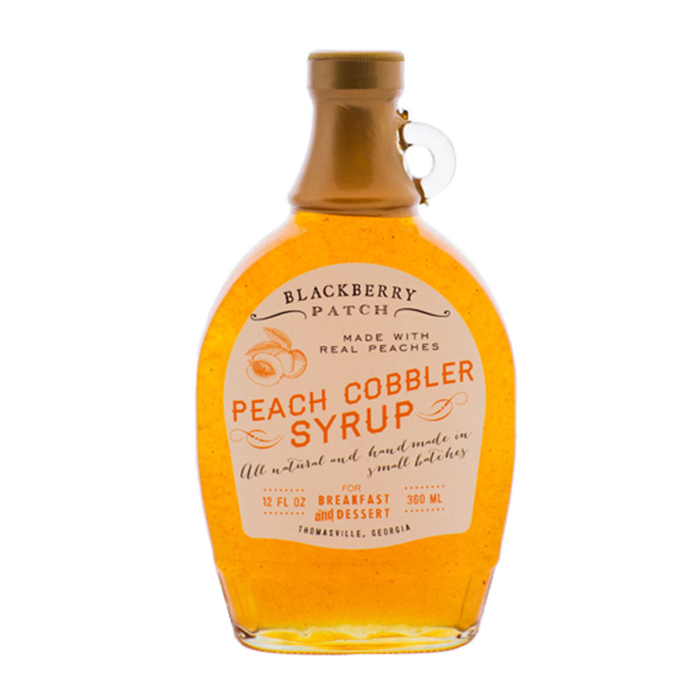 12 ounce glass container of Blackberry Patch Peach Cobbler Syrup
