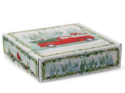 Decorative box with a red truck and greenery design on a white background
