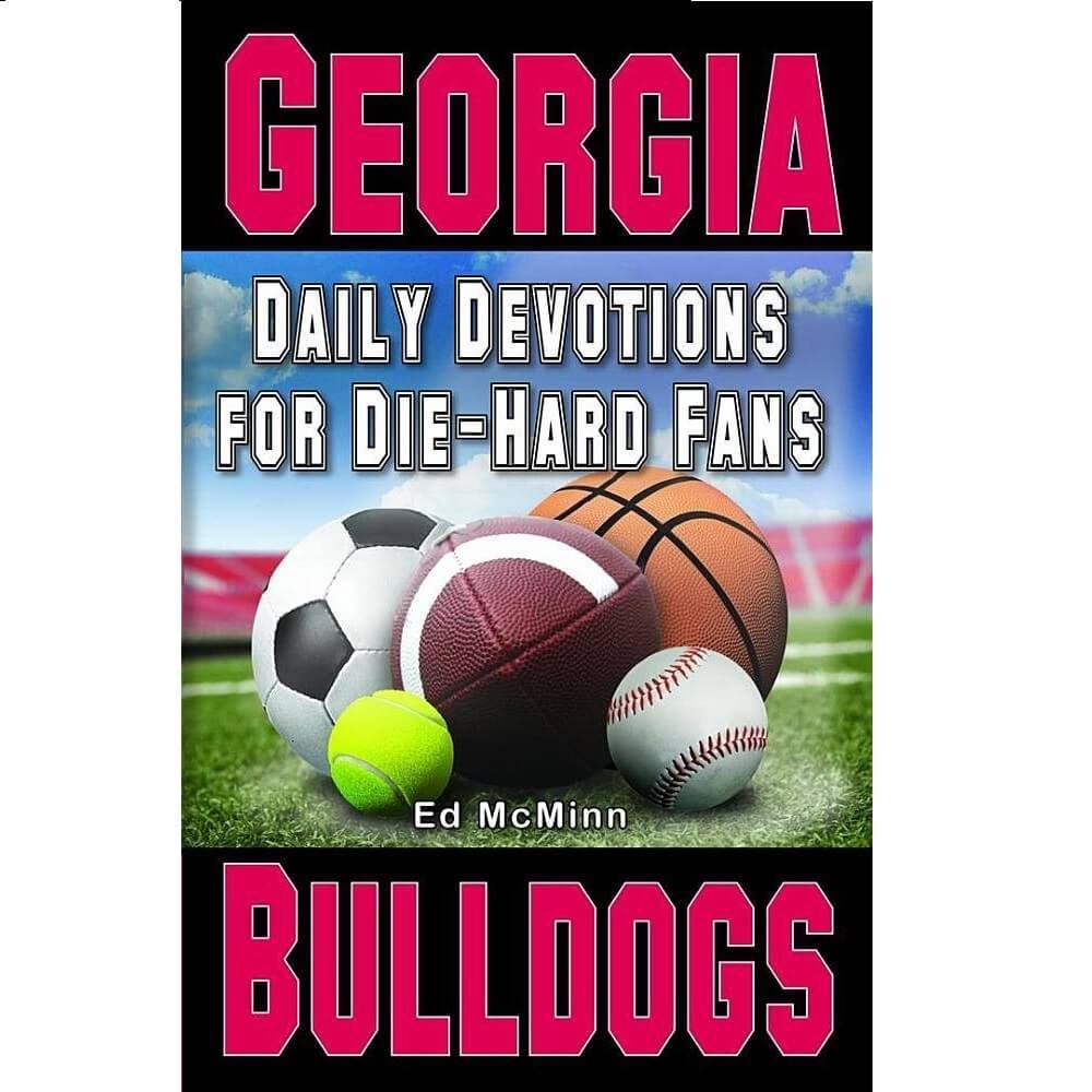 Paperback book of UGA Daily Devotions for Die Hard Fans with sports balls on the cover.