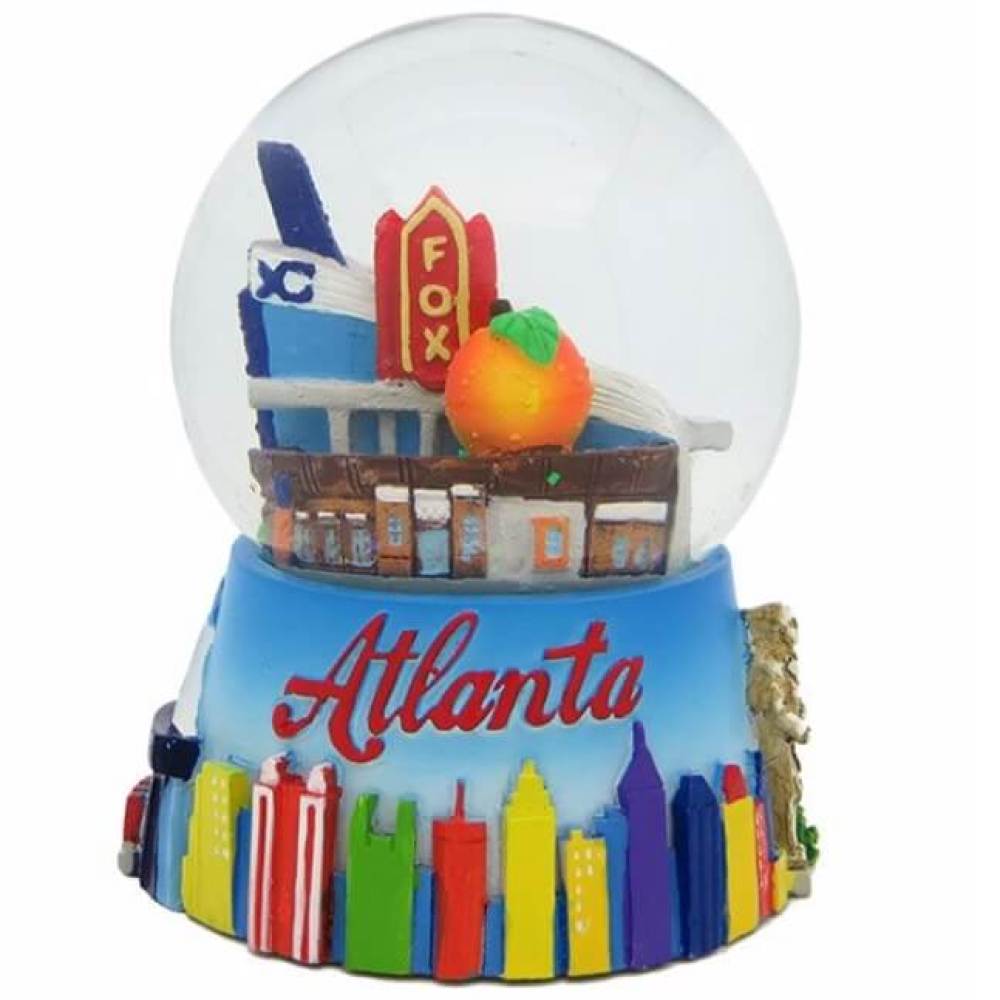 Colorful Atlanta snow globe with a blue base encircled with multicolor buildings and iconic Fox Theatre, Georgia Aquarium and Georgia peach inside.