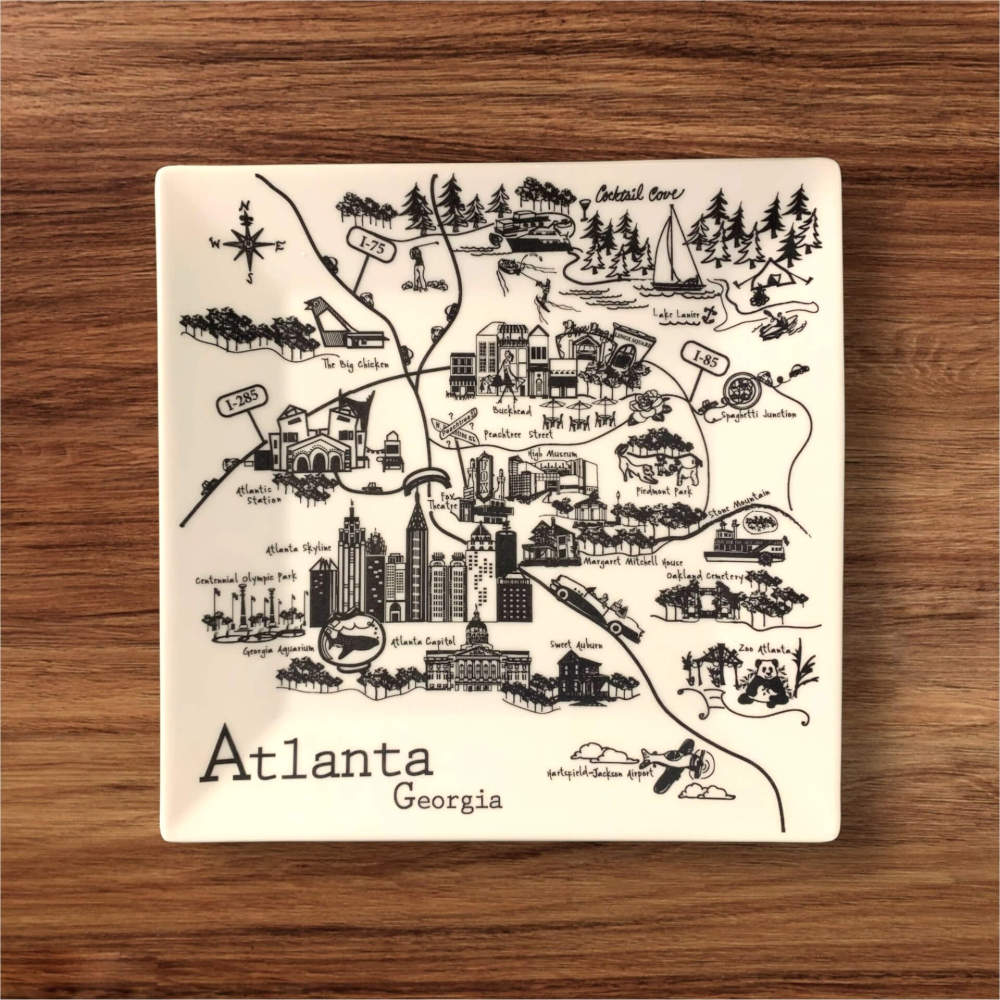 Square porcelain trinket tray with black and white handcrafted map design of Atlanta landmarks and attractions