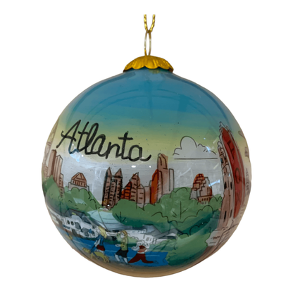 Hand-painted glass Atlanta ornament features local landmarks, including Fox Theatre, Skyline Ferris Wheel and State Capitol.