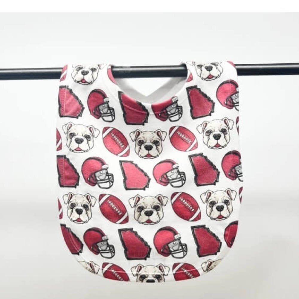 Baby big with little dogs, footballs and the state of Georgia repeated throughout in red and black