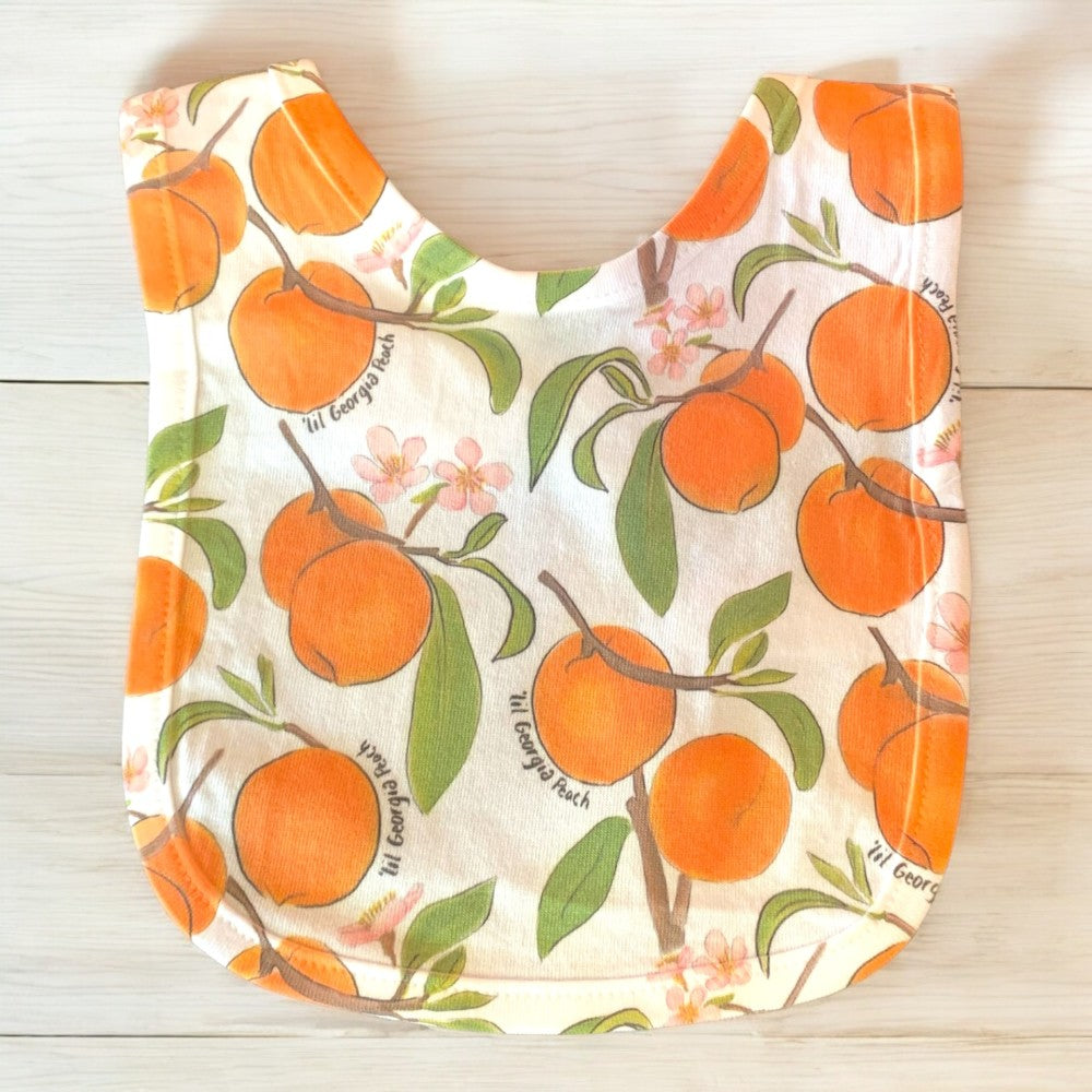 Georgia baby bib with peach design that reads Lil&
