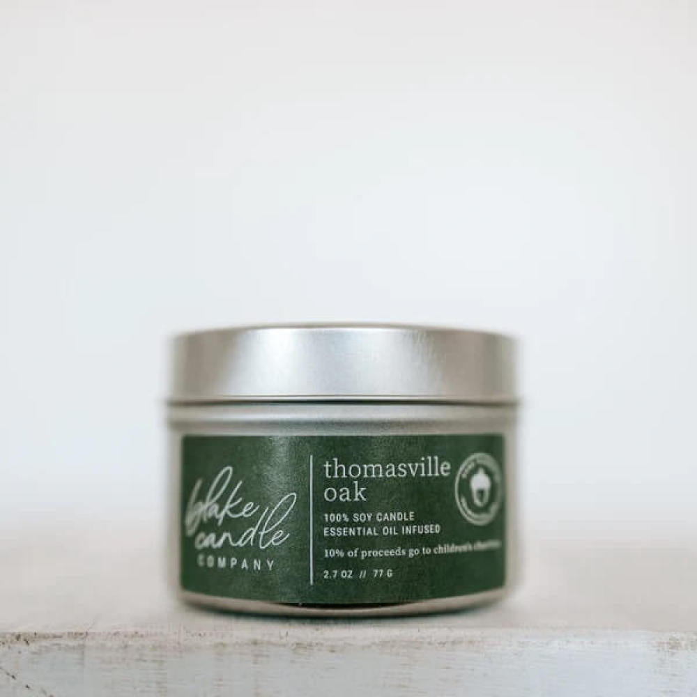 Inspired by the famous Thomasville Oak Tree, enjoy the woodsy scent of this travel candle tin