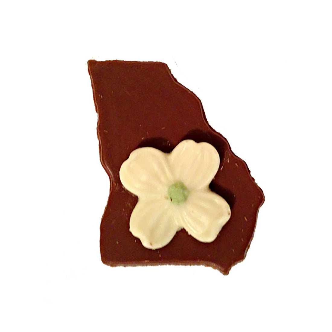 Chocolate candy shaped like the state of Georgia with a white petal and green center on a white background