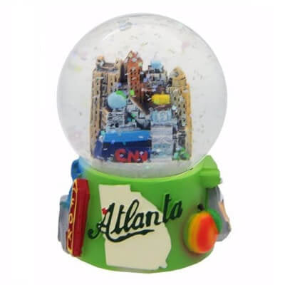 Glowing snow globe with Atlanta-themed design on a white background