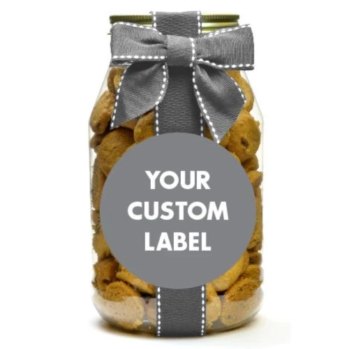 A clear plastic jar filled with chocolate chip cookies, tied with a gray ribbon bow, and featuring a large gray circular label that reads &