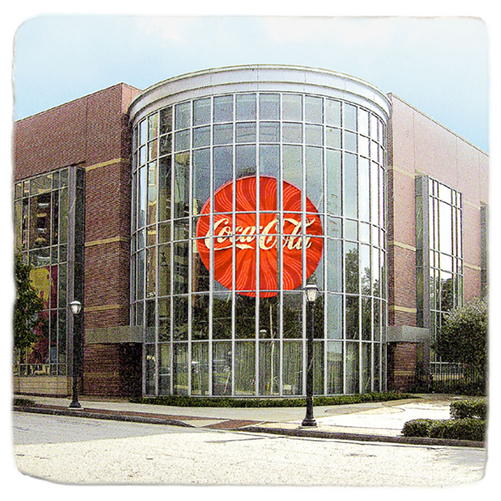 World of Coca Cola coaster with picture of the outside view of the World of Coke.