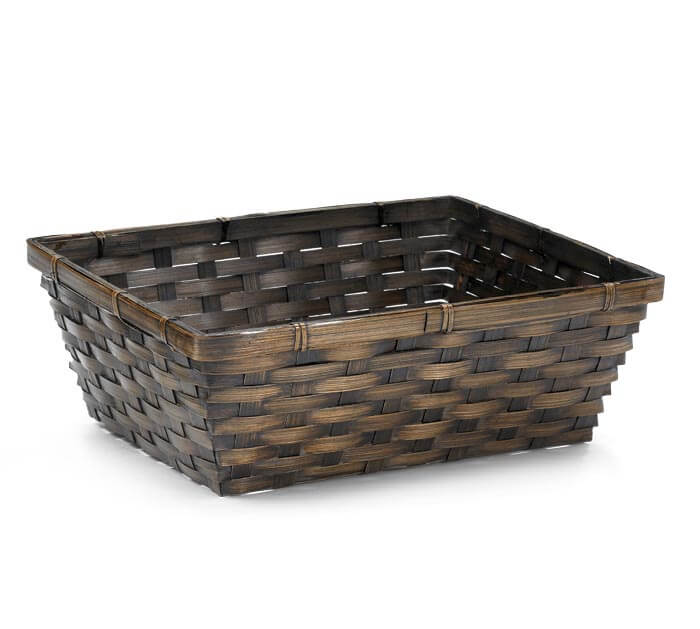 Woven brown basket on a white background