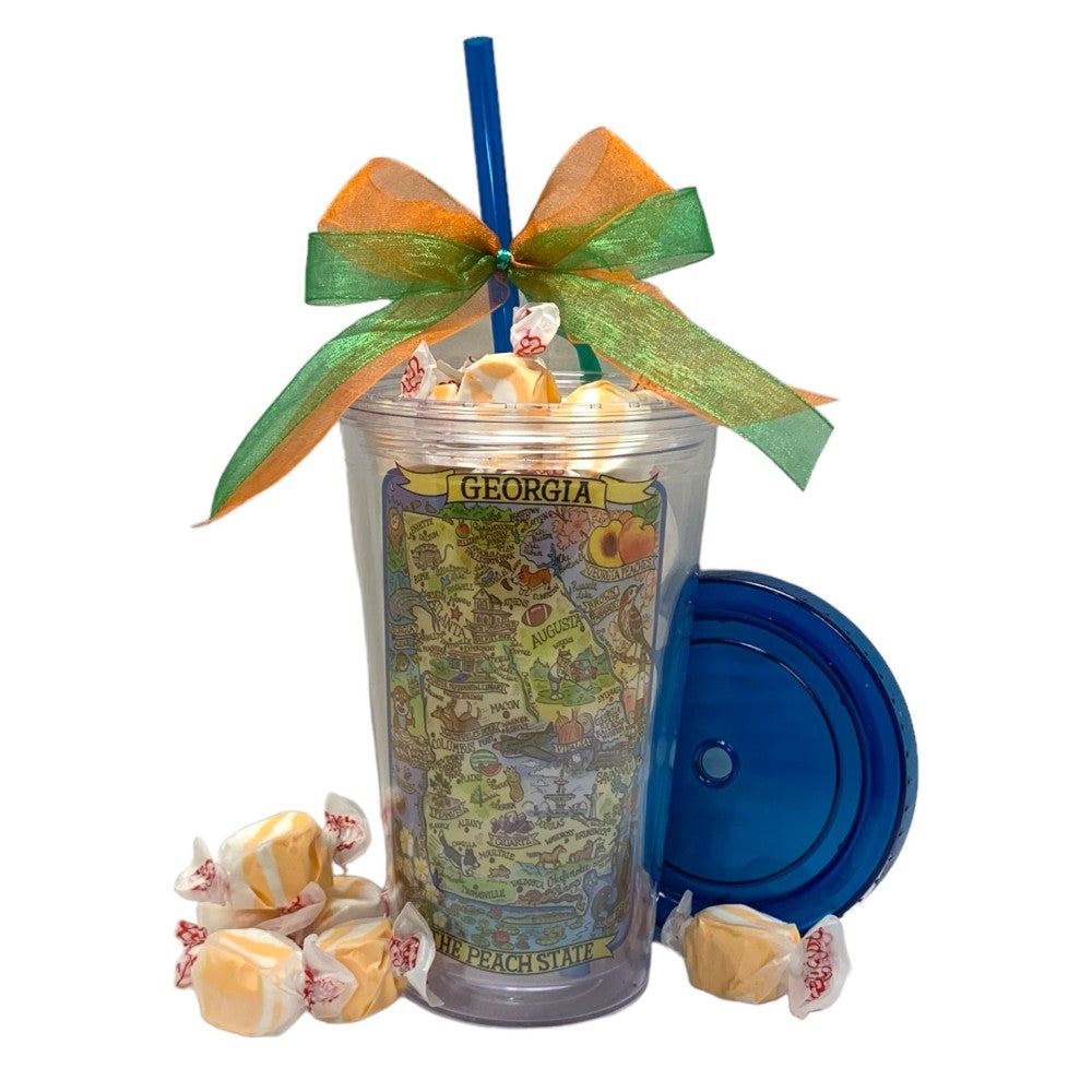 Acrylic Georgia travel tumbler with straw and vintage map design filled with peach taffy pieces