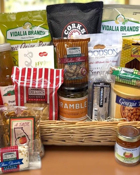 Assorted gourmet food items made in Georgia in a basket with visible brand names.