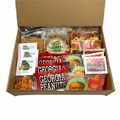 Box of Georgia-themed snacks and candies with visible branding on a white background