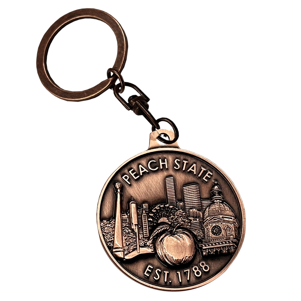 Reverse side of bronze keychain with &