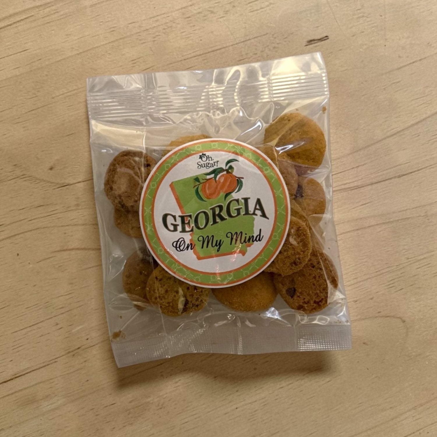 Packaged cookies with a Georgia on my mind label on a wooden surface