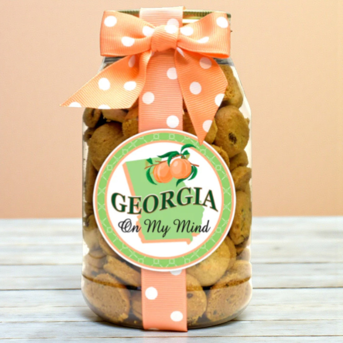 Jar of cookies with a decorative ribbon and &