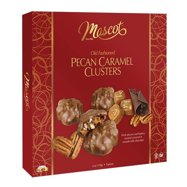 Red box of Mascot Old Fashioned Pecan Caramel Clusters on a white background