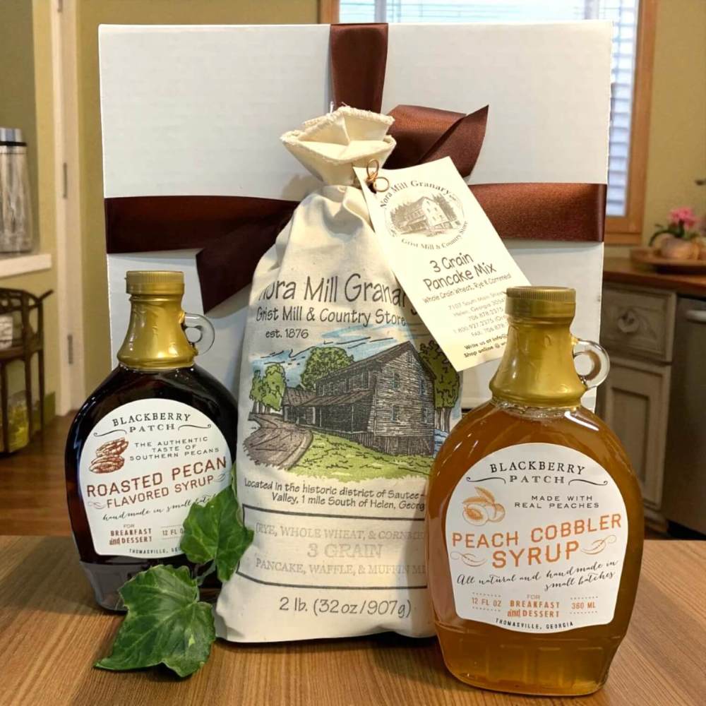 Hot Off The Griddle Pancake Gift Box that includes pancake mix, peach cobbler syrup and roasted pecan flavored syrup
