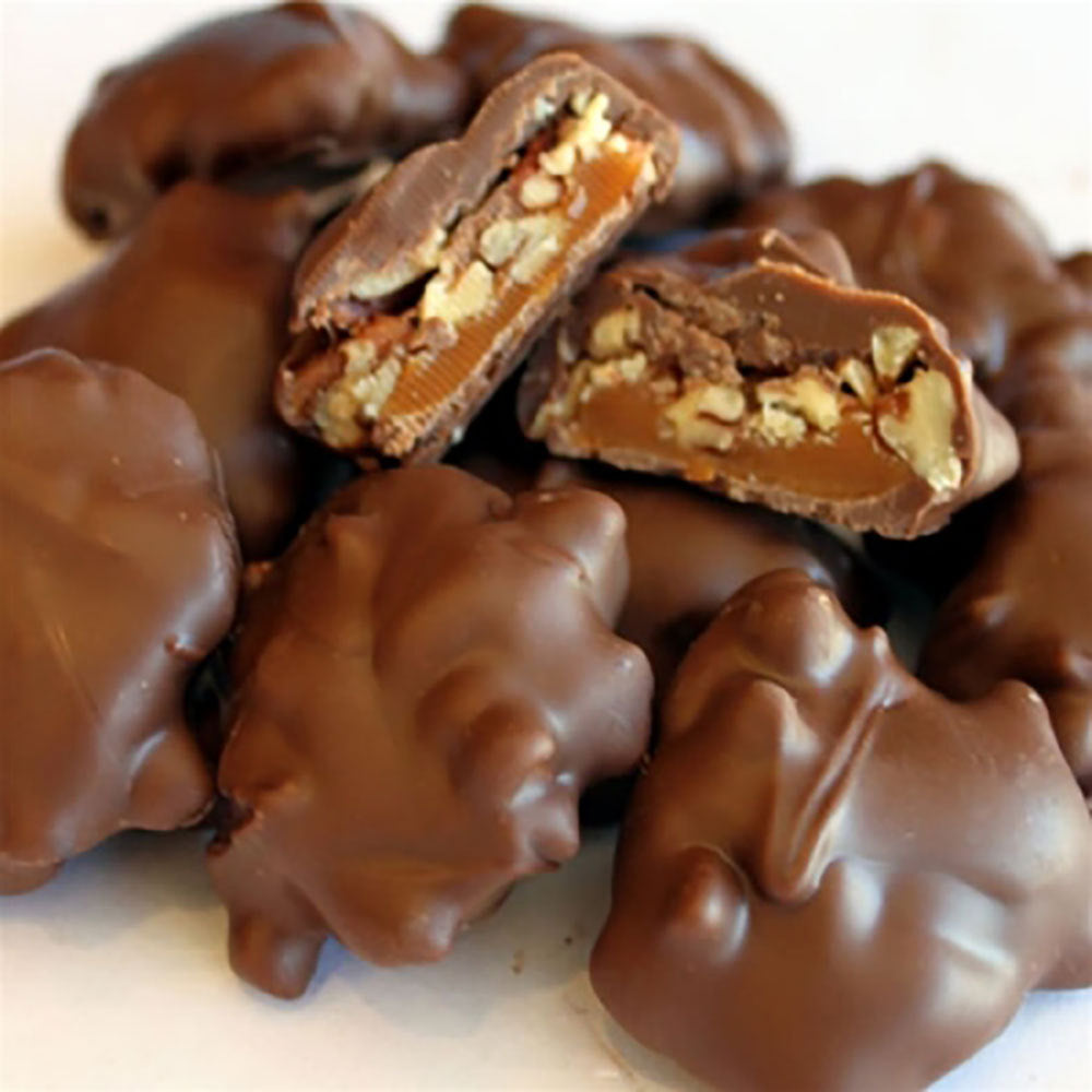 Group of unwrapped Georgia Pecan Caramel Clusters