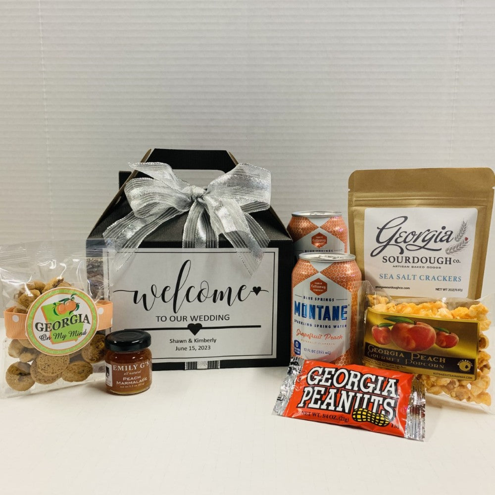 Welcome gift box with personalized label and assorted Georgia snacks