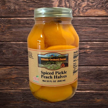 Glass jar of pickled peach halves from Georgia