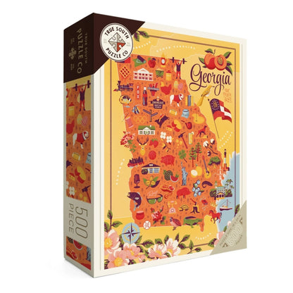 Front of the box of a Georgia Puzzle with cities and iconic images
