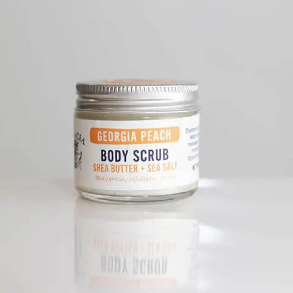 Glass jar of Georgia peach body scrub