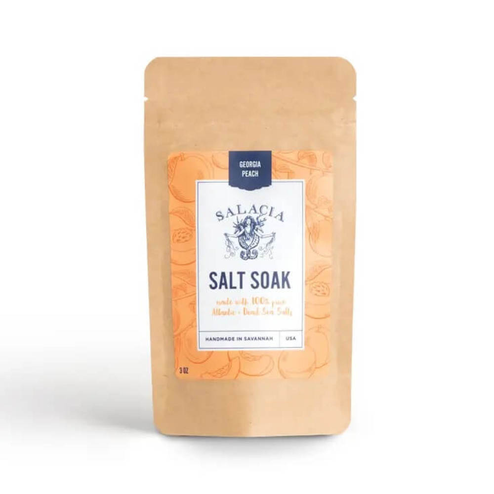 Kraft pouch of bath soak crystals with Georgia peach scent.