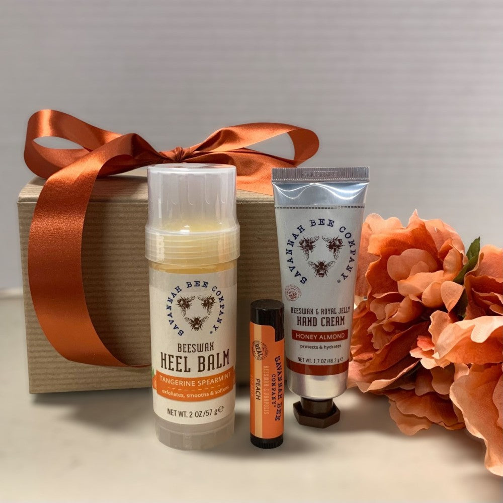Savannah Bee Skincare gift box that includes peach lip balm, heel balm and hand cream