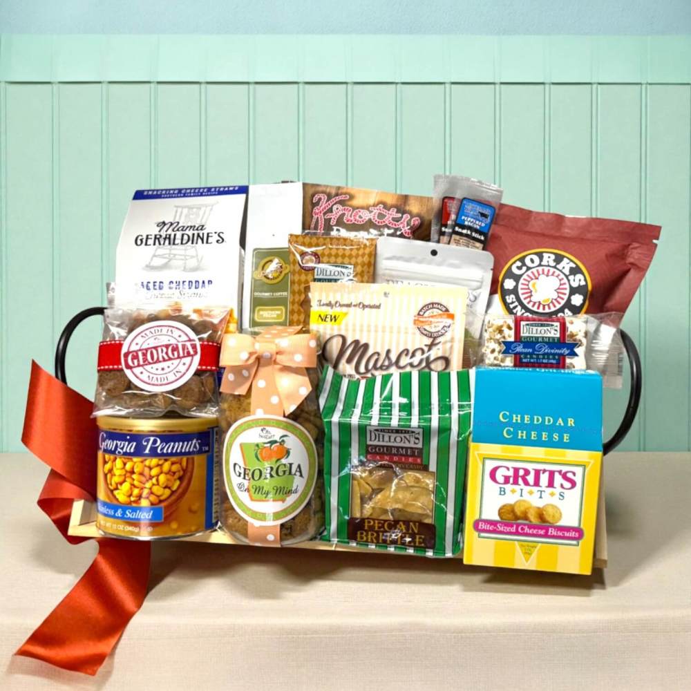 Wood tray filled with cookies, popcorn, pretzels, coffee, beef sticks and assorted Georgia foods make up this Southern Comfort Georgia Gift Basket