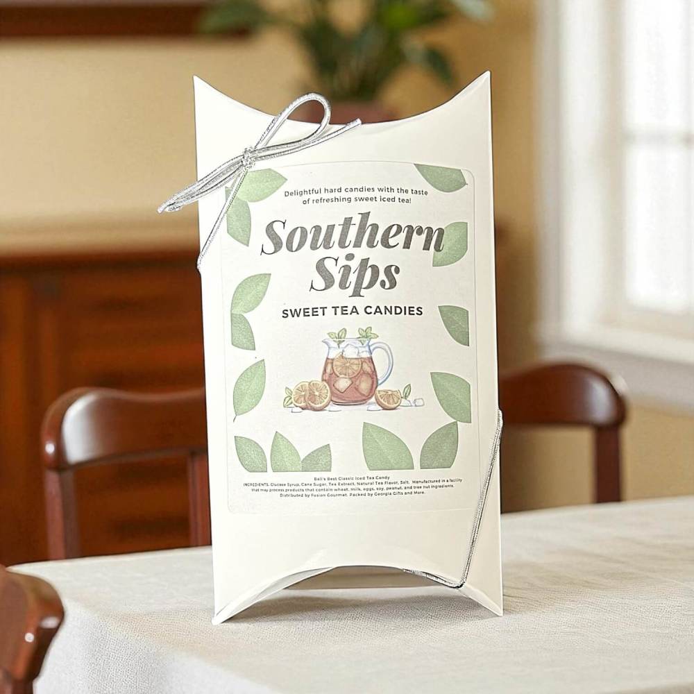Packaging of Southern Sips sweet tea candies on a table with a blurred background