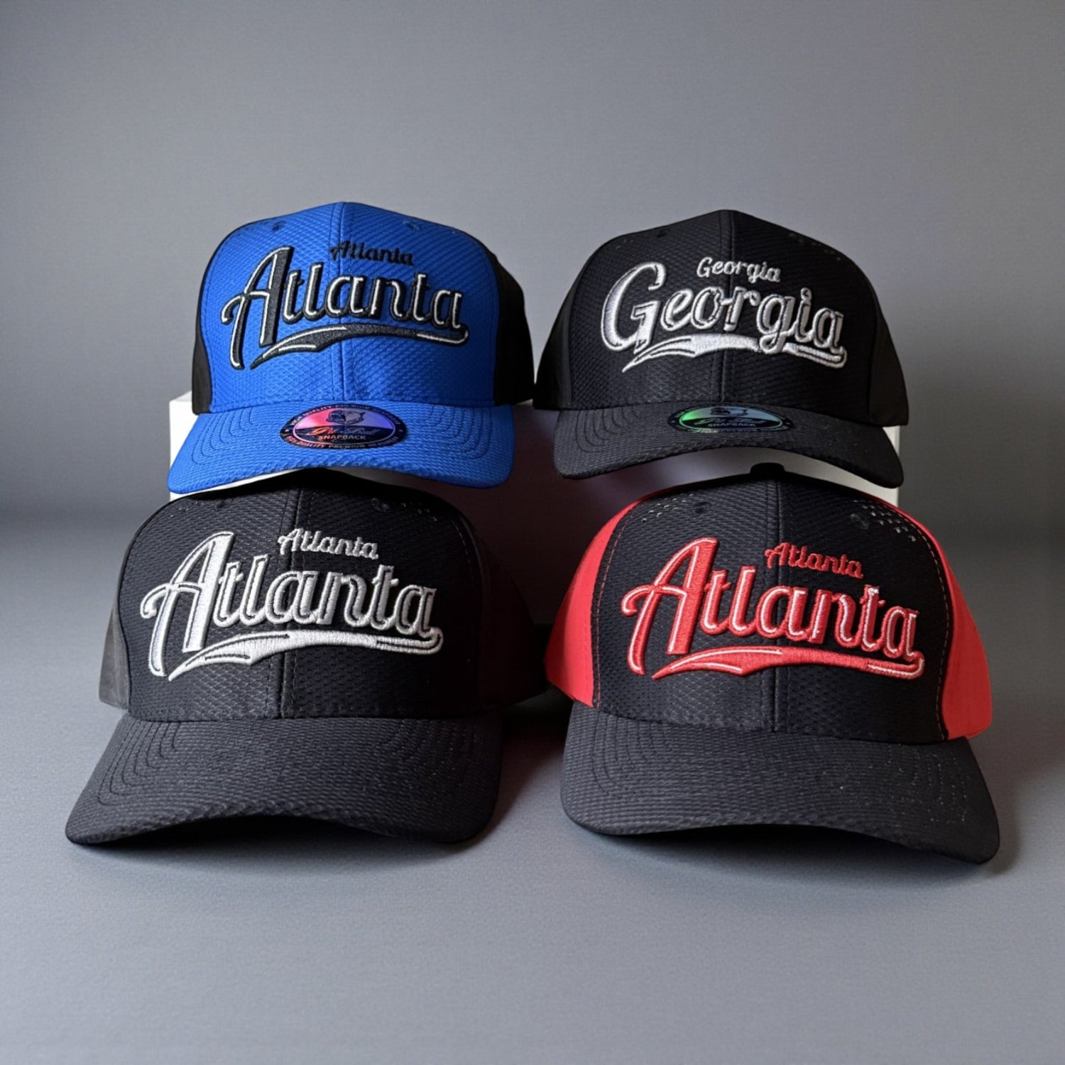 Four baseball caps with &
