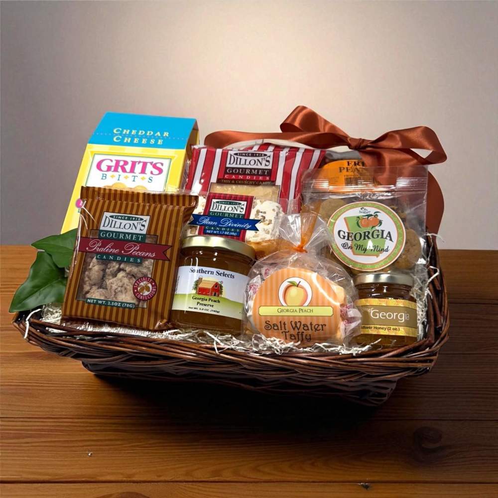 Georgia Food Gift Basket with honey, preserves, praline pecans, peanut brittle and assorted Georgia snacks in a wicker basket.