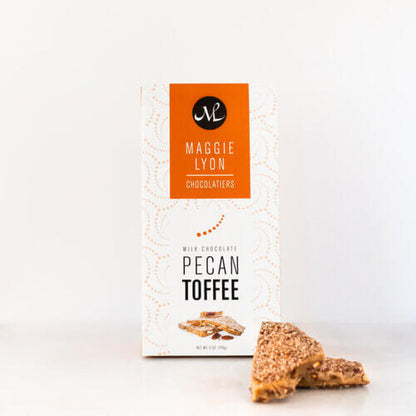 Box of milk chocolate coated toffee made with toasted pecans.