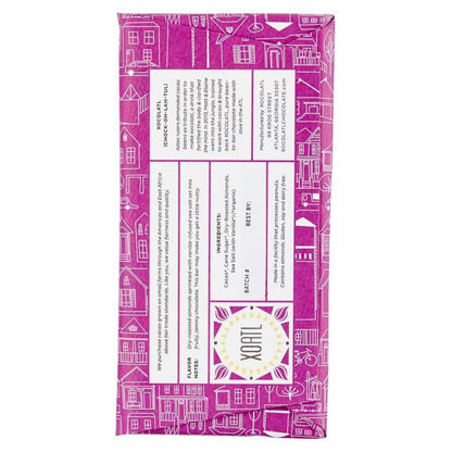 Backside of Xocolatl Go Nuts Chocolate with pink package with white text and illustrations on a white background
